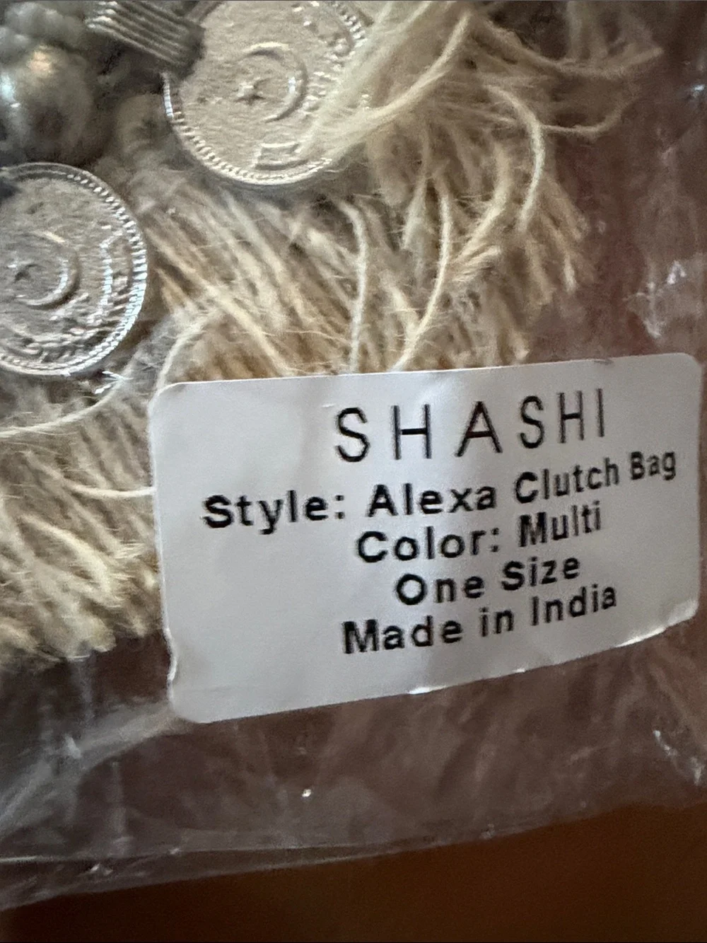 SHASHI Cream and Black Beaded Coin Fringe Clutch